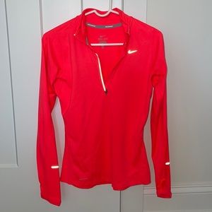 Coral colored Nike pullover
